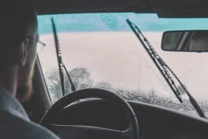 driving-windshield-car-raining-windshield-wipers